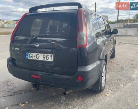 Черный Ниссан ИксТрейл, объемом двигателя 2.2 л и пробегом 308 тыс. км за 2800 $, фото 3 на Automoto.ua