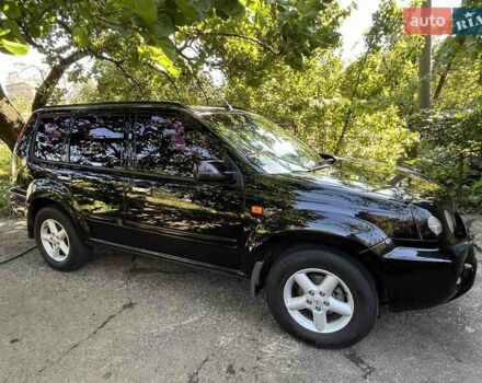 Черный Ниссан ИксТрейл, объемом двигателя 2.5 л и пробегом 287 тыс. км за 7700 $, фото 10 на Automoto.ua