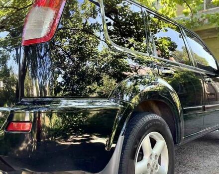 Черный Ниссан ИксТрейл, объемом двигателя 2.5 л и пробегом 287 тыс. км за 7700 $, фото 8 на Automoto.ua