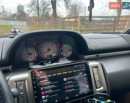 Черный Ниссан ИксТрейл, объемом двигателя 2 л и пробегом 215 тыс. км за 6490 $, фото 12 на Automoto.ua