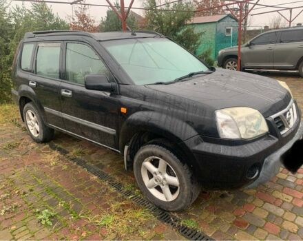 Черный Ниссан ИксТрейл, объемом двигателя 2.2 л и пробегом 370 тыс. км за 2950 $, фото 2 на Automoto.ua