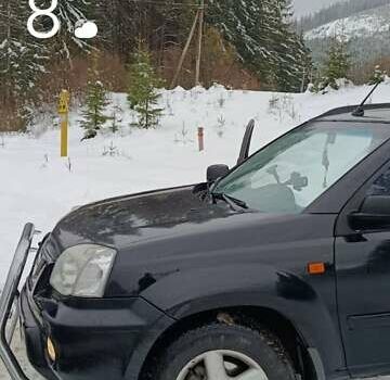 Черный Ниссан ИксТрейл, объемом двигателя 2 л и пробегом 276 тыс. км за 6000 $, фото 2 на Automoto.ua