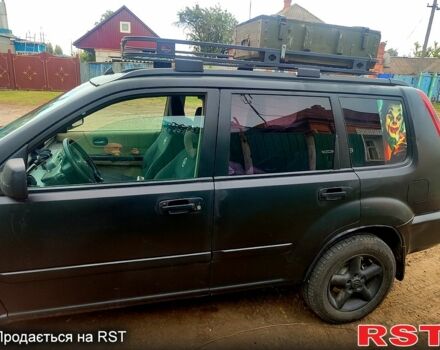 Черный Ниссан ИксТрейл, объемом двигателя 2.2 л и пробегом 357 тыс. км за 4000 $, фото 3 на Automoto.ua