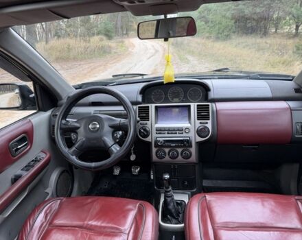 Черный Ниссан ИксТрейл, объемом двигателя 2.2 л и пробегом 225 тыс. км за 3800 $, фото 12 на Automoto.ua