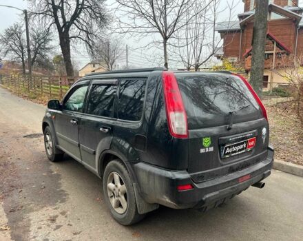 Черный Ниссан ИксТрейл, объемом двигателя 2 л и пробегом 215 тыс. км за 6490 $, фото 6 на Automoto.ua