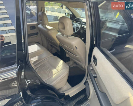 Черный Ниссан ИксТрейл, объемом двигателя 2.5 л и пробегом 318 тыс. км за 8000 $, фото 10 на Automoto.ua