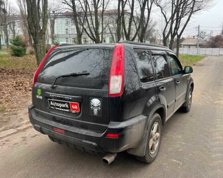 Черный Ниссан ИксТрейл, объемом двигателя 2 л и пробегом 215 тыс. км за 6490 $, фото 4 на Automoto.ua