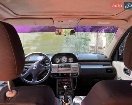 Черный Ниссан ИксТрейл, объемом двигателя 2.5 л и пробегом 287 тыс. км за 7700 $, фото 3 на Automoto.ua