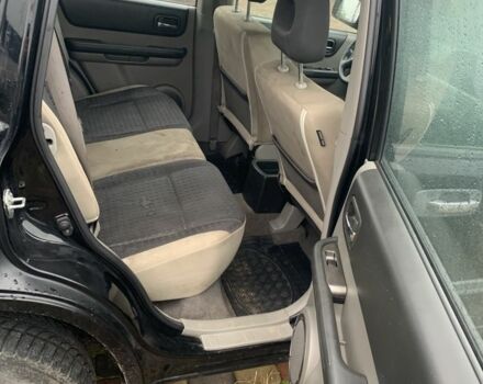 Черный Ниссан ИксТрейл, объемом двигателя 2.2 л и пробегом 370 тыс. км за 2950 $, фото 5 на Automoto.ua