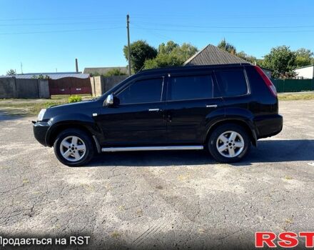 Черный Ниссан ИксТрейл, объемом двигателя 2.5 л и пробегом 245 тыс. км за 6500 $, фото 1 на Automoto.ua