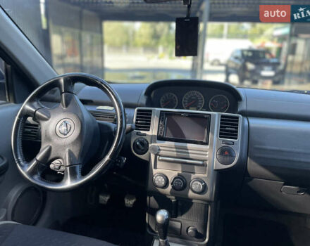 Черный Ниссан ИксТрейл, объемом двигателя 2 л и пробегом 215 тыс. км за 7000 $, фото 20 на Automoto.ua