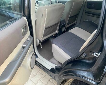 Черный Ниссан ИксТрейл, объемом двигателя 2.2 л и пробегом 251 тыс. км за 3800 $, фото 13 на Automoto.ua