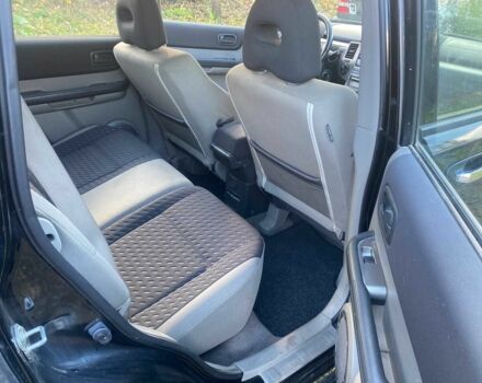 Черный Ниссан ИксТрейл, объемом двигателя 2.2 л и пробегом 339 тыс. км за 3850 $, фото 10 на Automoto.ua