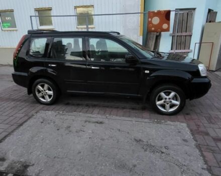 Черный Ниссан ИксТрейл, объемом двигателя 2.2 л и пробегом 222 тыс. км за 3323 $, фото 2 на Automoto.ua