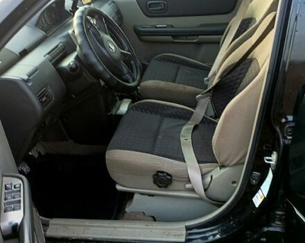 Черный Ниссан ИксТрейл, объемом двигателя 2.2 л и пробегом 294 тыс. км за 5000 $, фото 5 на Automoto.ua