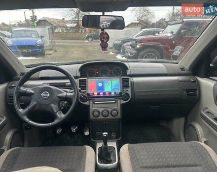 Черный Ниссан ИксТрейл, объемом двигателя 2 л и пробегом 173 тыс. км за 4700 $, фото 10 на Automoto.ua