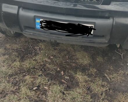 Черный Ниссан ИксТрейл, объемом двигателя 2 л и пробегом 270 тыс. км за 2700 $, фото 4 на Automoto.ua