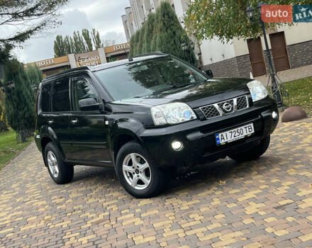 Чорний Ніссан ІксТрейл, об'ємом двигуна 2.5 л та пробігом 179 тис. км за 6800 $, фото 46 на Automoto.ua