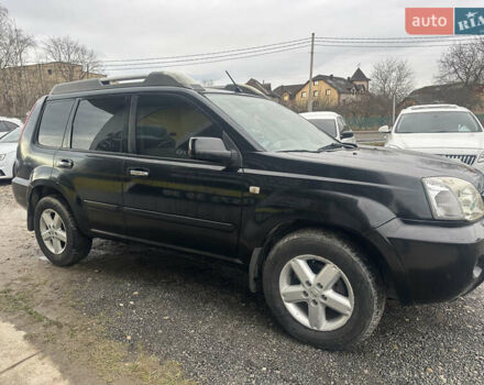 Черный Ниссан ИксТрейл, объемом двигателя 2 л и пробегом 173 тыс. км за 4700 $, фото 3 на Automoto.ua