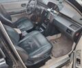 Чорний Ніссан ІксТрейл, об'ємом двигуна 2 л та пробігом 216 тис. км за 5000 $, фото 4 на Automoto.ua