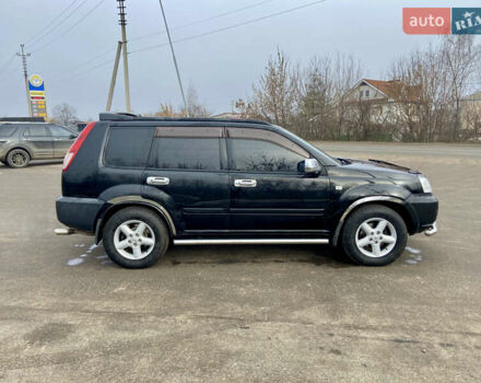 Черный Ниссан ИксТрейл, объемом двигателя 2.49 л и пробегом 300 тыс. км за 6200 $, фото 5 на Automoto.ua