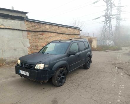 Черный Ниссан ИксТрейл, объемом двигателя 2.2 л и пробегом 250 тыс. км за 2750 $, фото 4 на Automoto.ua