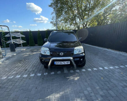 Черный Ниссан ИксТрейл, объемом двигателя 2 л и пробегом 215 тыс. км за 7000 $, фото 4 на Automoto.ua