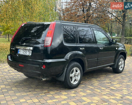 Чорний Ніссан ІксТрейл, об'ємом двигуна 2.5 л та пробігом 179 тис. км за 6800 $, фото 4 на Automoto.ua