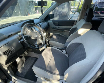 Черный Ниссан ИксТрейл, объемом двигателя 2 л и пробегом 215 тыс. км за 7000 $, фото 21 на Automoto.ua