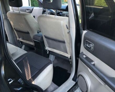 Черный Ниссан ИксТрейл, объемом двигателя 2.2 л и пробегом 266 тыс. км за 2200 $, фото 4 на Automoto.ua