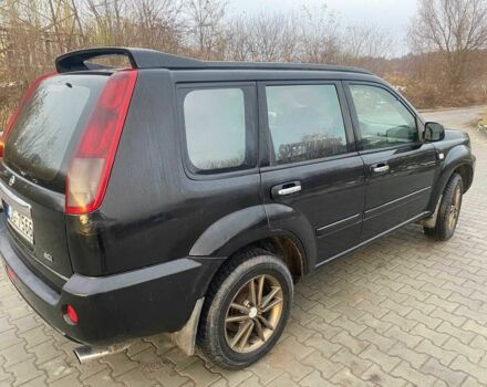 Черный Ниссан ИксТрейл, объемом двигателя 2.2 л и пробегом 251 тыс. км за 3800 $, фото 2 на Automoto.ua