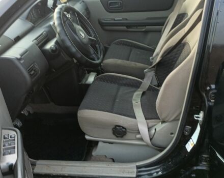 Черный Ниссан ИксТрейл, объемом двигателя 2.2 л и пробегом 294 тыс. км за 5000 $, фото 4 на Automoto.ua