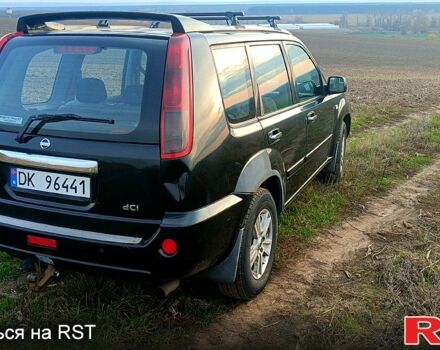 Черный Ниссан ИксТрейл, объемом двигателя 2.2 л и пробегом 294 тыс. км за 5000 $, фото 1 на Automoto.ua