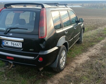 Черный Ниссан ИксТрейл, объемом двигателя 2.2 л и пробегом 294 тыс. км за 5000 $, фото 1 на Automoto.ua