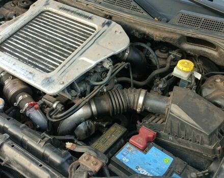 Черный Ниссан ИксТрейл, объемом двигателя 2.2 л и пробегом 294 тыс. км за 5000 $, фото 7 на Automoto.ua