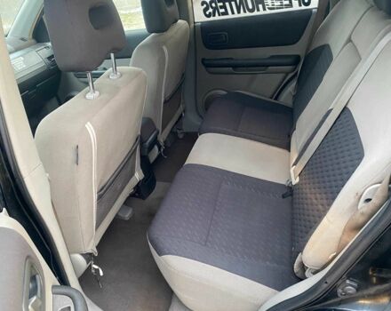 Черный Ниссан ИксТрейл, объемом двигателя 2.2 л и пробегом 251 тыс. км за 3800 $, фото 11 на Automoto.ua