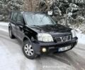 Черный Ниссан ИксТрейл, объемом двигателя 2.2 л и пробегом 237 тыс. км за 2235 $, фото 1 на Automoto.ua