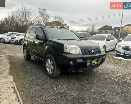 Черный Ниссан ИксТрейл, объемом двигателя 2 л и пробегом 173 тыс. км за 4700 $, фото 2 на Automoto.ua