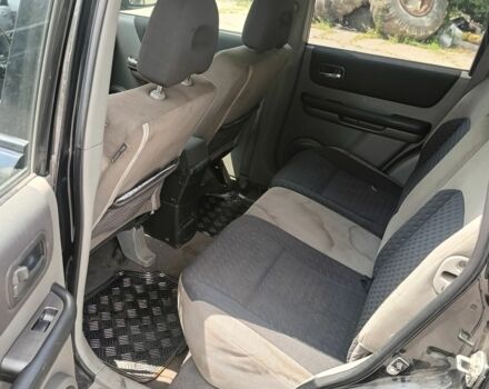 Черный Ниссан ИксТрейл, объемом двигателя 2.2 л и пробегом 338 тыс. км за 2900 $, фото 5 на Automoto.ua