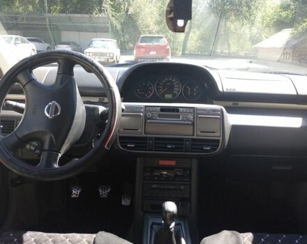 Черный Ниссан ИксТрейл, объемом двигателя 2 л и пробегом 270 тыс. км за 4000 $, фото 6 на Automoto.ua