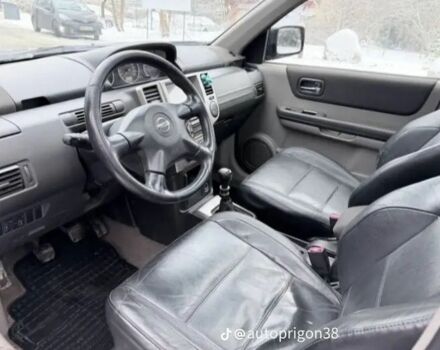 Черный Ниссан ИксТрейл, объемом двигателя 2.2 л и пробегом 237 тыс. км за 2235 $, фото 7 на Automoto.ua