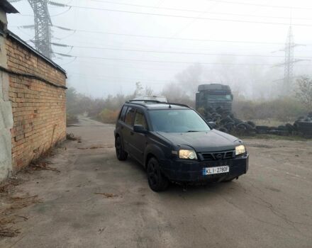 Черный Ниссан ИксТрейл, объемом двигателя 2.2 л и пробегом 250 тыс. км за 2750 $, фото 2 на Automoto.ua