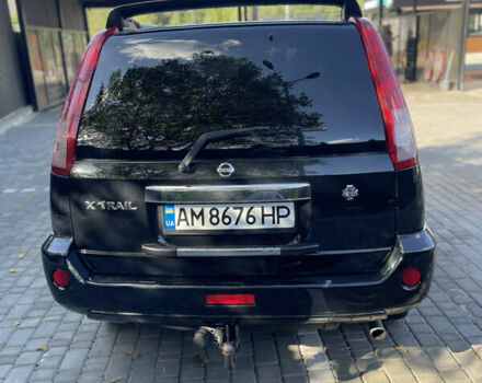 Черный Ниссан ИксТрейл, объемом двигателя 2 л и пробегом 215 тыс. км за 7000 $, фото 12 на Automoto.ua