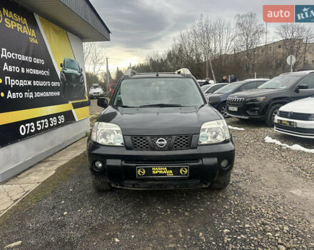 Черный Ниссан ИксТрейл, объемом двигателя 2 л и пробегом 173 тыс. км за 4700 $, фото 1 на Automoto.ua