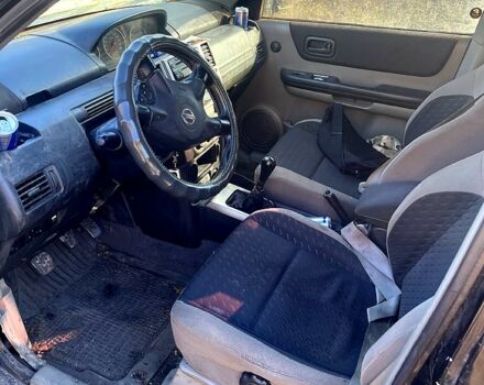 Черный Ниссан ИксТрейл, объемом двигателя 2.5 л и пробегом 365 тыс. км за 4500 $, фото 2 на Automoto.ua