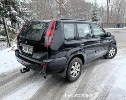Черный Ниссан ИксТрейл, объемом двигателя 2.2 л и пробегом 237 тыс. км за 2235 $, фото 2 на Automoto.ua