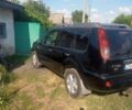 Черный Ниссан ИксТрейл, объемом двигателя 2.2 л и пробегом 276 тыс. км за 4200 $, фото 12 на Automoto.ua