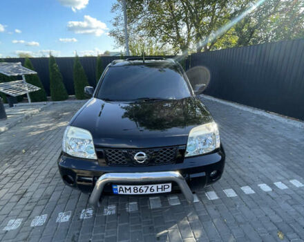 Черный Ниссан ИксТрейл, объемом двигателя 2 л и пробегом 215 тыс. км за 7000 $, фото 6 на Automoto.ua