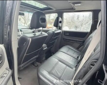 Черный Ниссан ИксТрейл, объемом двигателя 2.2 л и пробегом 237 тыс. км за 2235 $, фото 4 на Automoto.ua