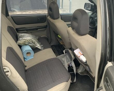 Чорний Ніссан ІксТрейл, об'ємом двигуна 2.2 л та пробігом 390 тис. км за 3561 $, фото 7 на Automoto.ua